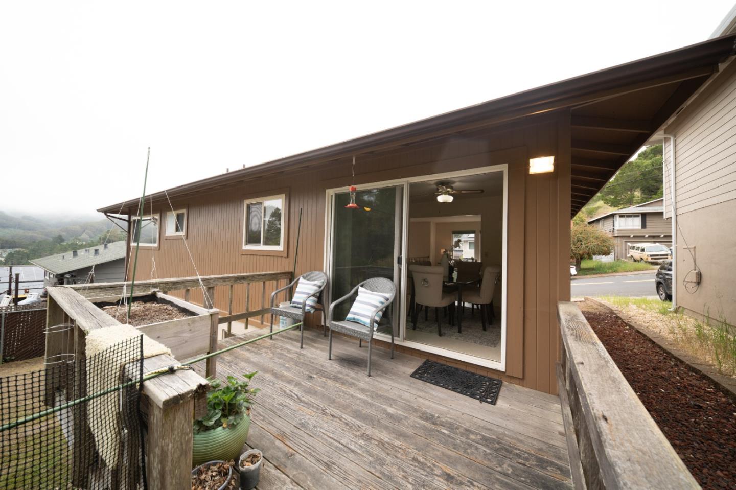 1287 Lerida Way Pacifica, CA 94044 - Photo 48 of 52 a backyard of a house with seating space