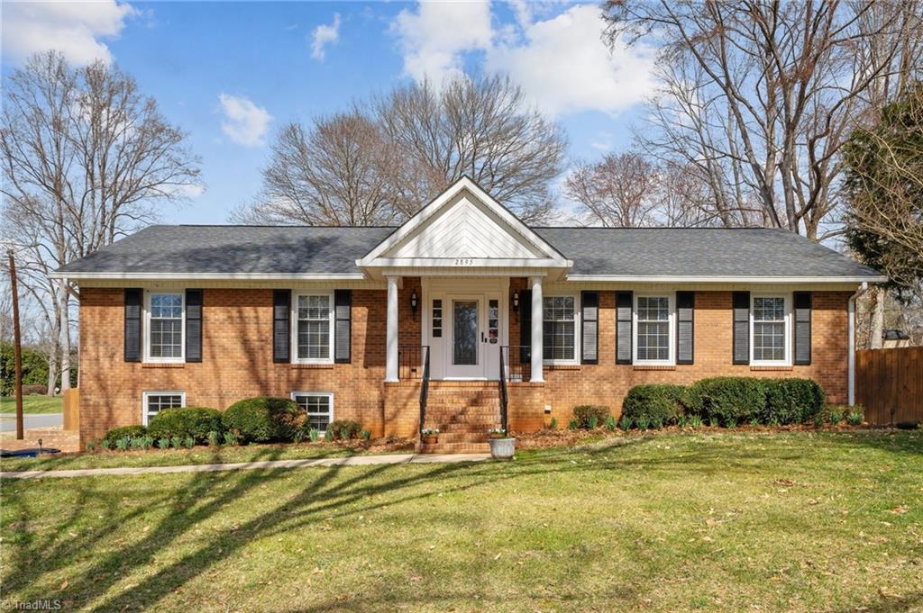 2895 Farmbrook Road Winston-Salem, NC 27103 - Photo 1 of 49 Updated Brick Ranch on spacious corner lot with fenced backyard