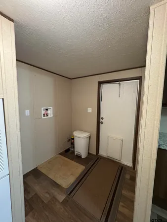 a bathroom with a toilet and a sink