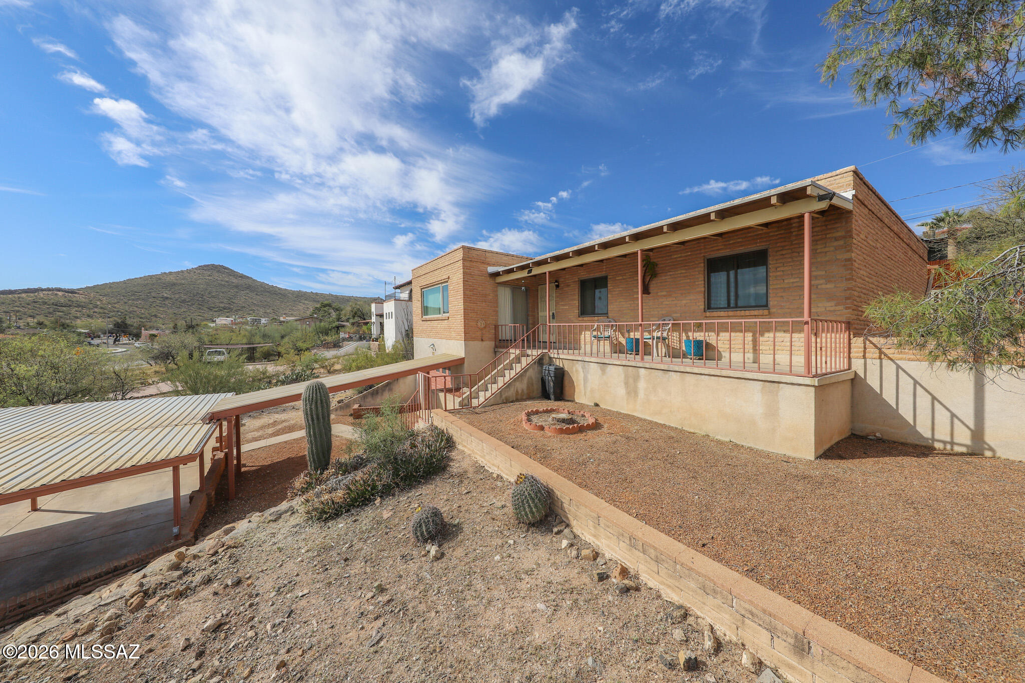 37 North Silverbell Road Tucson, AZ 85745 - Photo 3 of 31 a view of a house with a patio