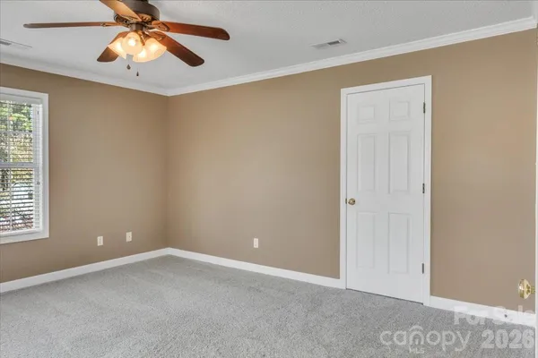 a view of an empty room with window