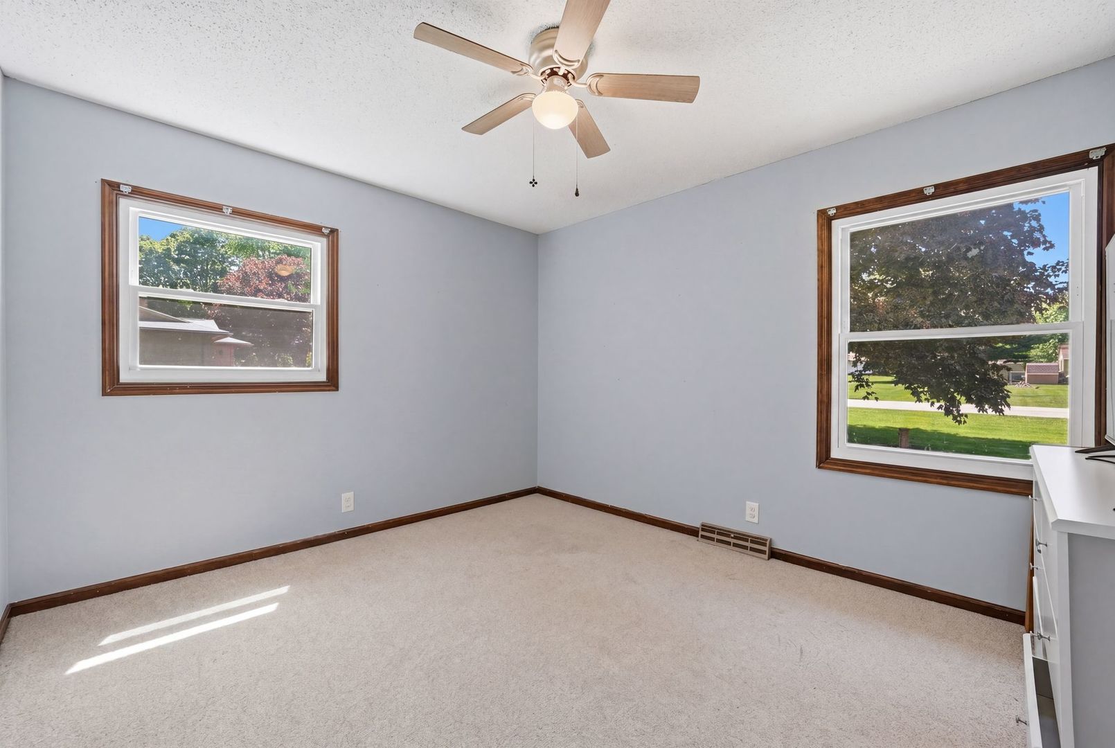 5645 Beebe Drive Rochelle, IL 61068 - Photo 20 of 43 an empty room with a window and a ceiling fan