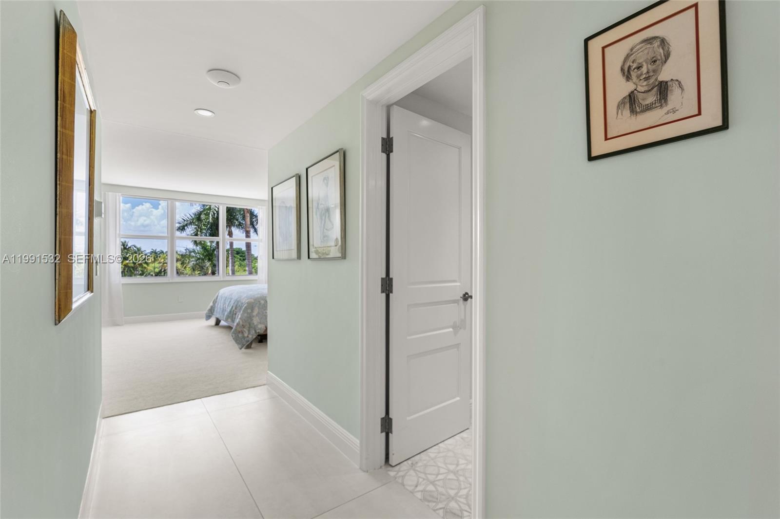 9801 Collins Avenue, Unit 5R Bal Harbour, FL 33154 - Photo 24 of 47 a very nice looking room with a large window