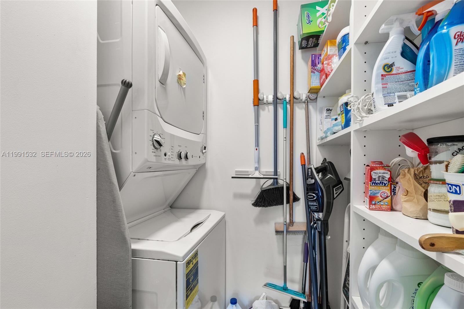 9801 Collins Avenue, Unit 5R Bal Harbour, FL 33154 - Photo 28 of 47 a utility room with dryer and washer