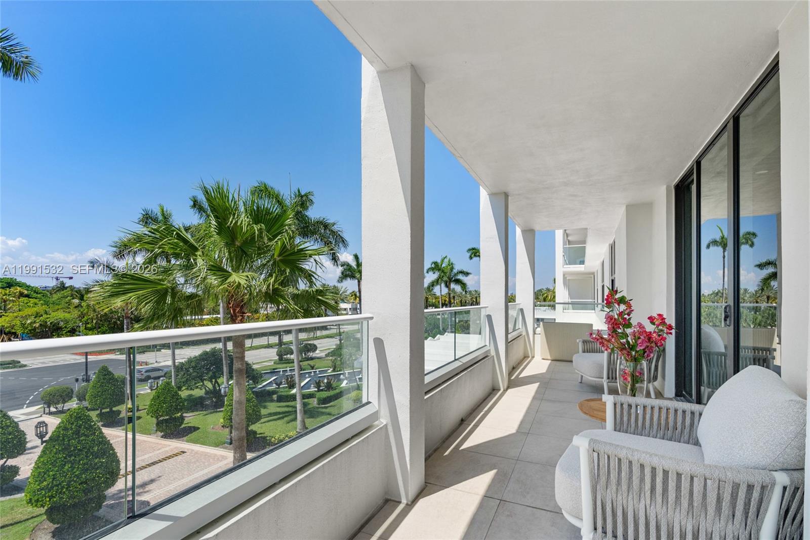 9801 Collins Avenue, Unit 5R Bal Harbour, FL 33154 - Photo 30 of 47 a view of a porch with furniture