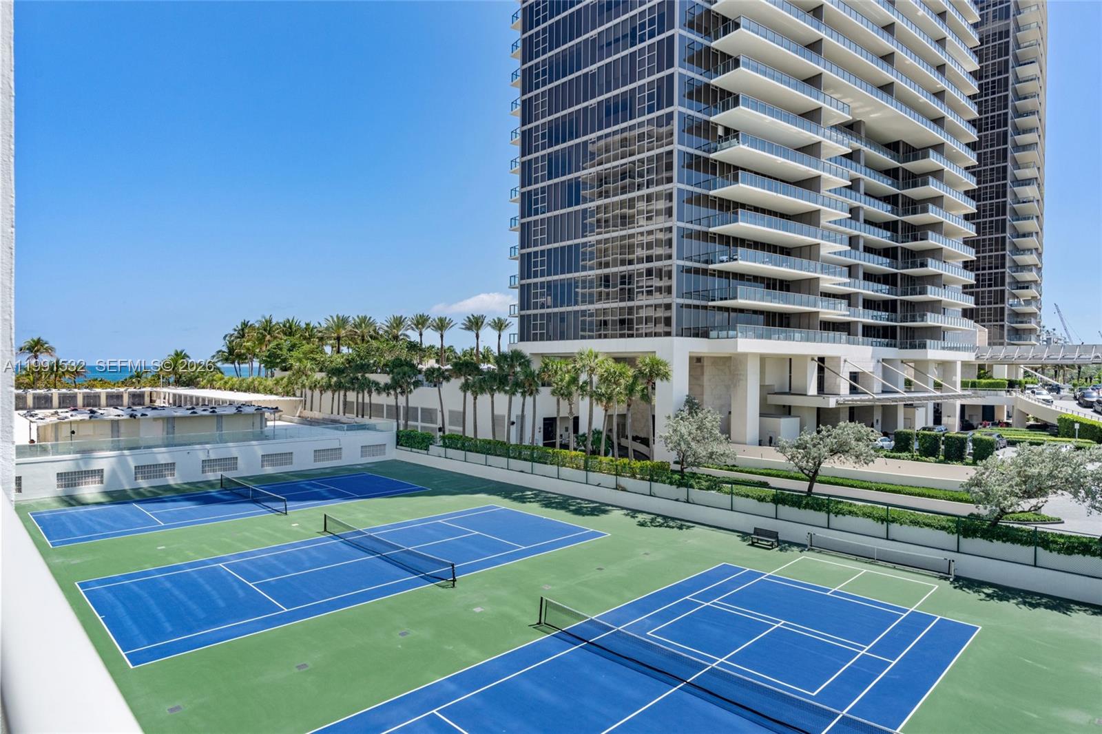 9801 Collins Avenue, Unit 5R Bal Harbour, FL 33154 - Photo 34 of 47 a view of an outdoor space and swimming pool