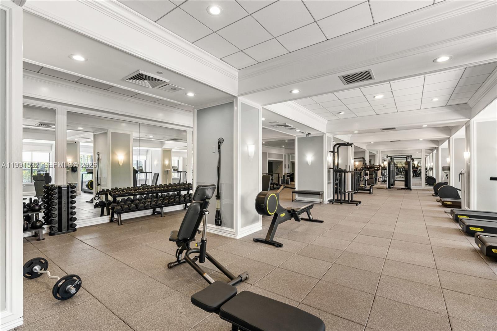 9801 Collins Avenue, Unit 5R Bal Harbour, FL 33154 - Photo 36 of 47 a view of a room with gym equipment