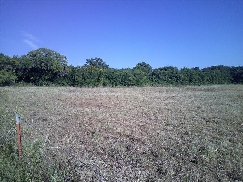 1 West Rc Bowie Tx 76230 Bowie, TX 76230 - Photo 12 of 13 a view of dirt field with trees in background