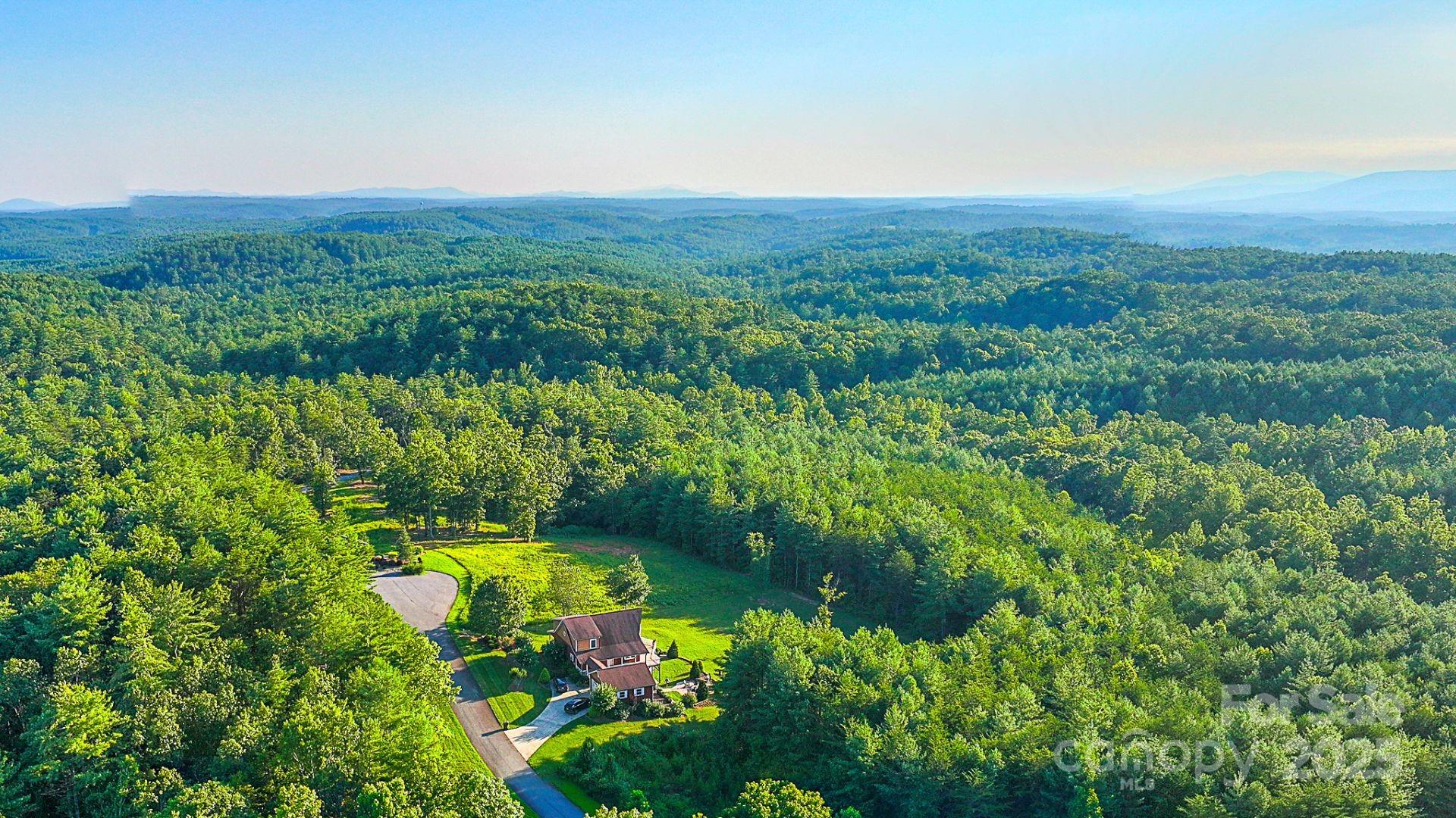 1106 Table View Drive Morganton, NC 28655 - Photo 4 of 12 a view of a garden with an outdoor space