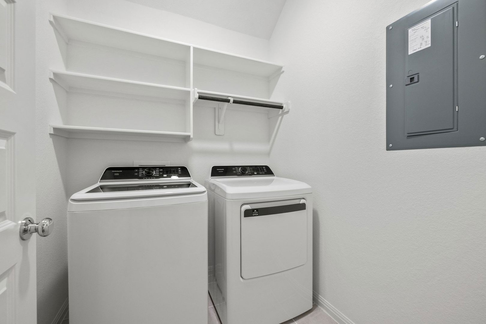 222 Spirit Street Elgin, TX 78621 - Photo 23 of 40 a view of storage and utility room with washer and dryer