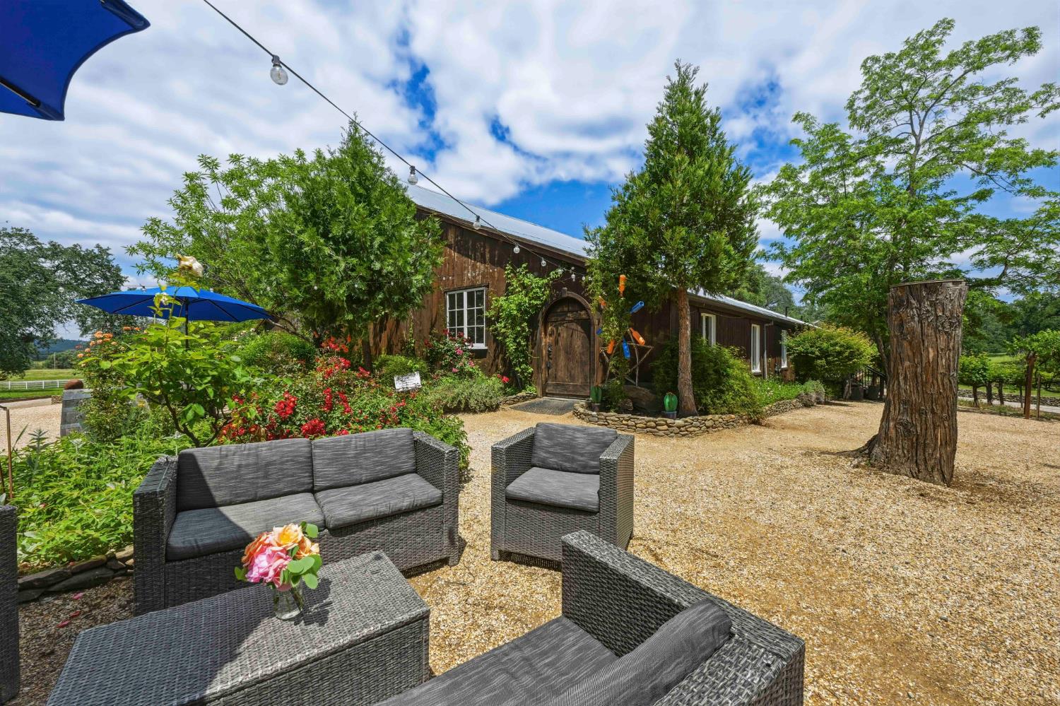 10120 Shenandoah Road Plymouth, CA 95669 - Photo 66 of 86 a view of a backyard with couches and a fire pit