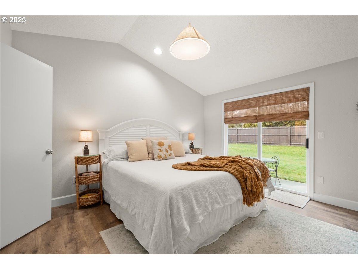 2018 North 4th Way Ridgefield, WA 98642 - Photo 22 of 39 a bedroom with a bed and a large window