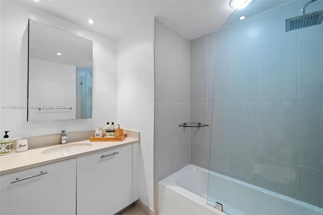 a view of a patio with couches and potted plants