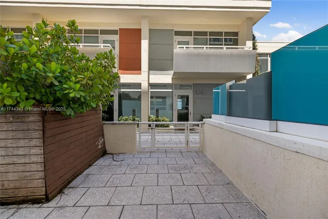 a view of a hallway with entryway