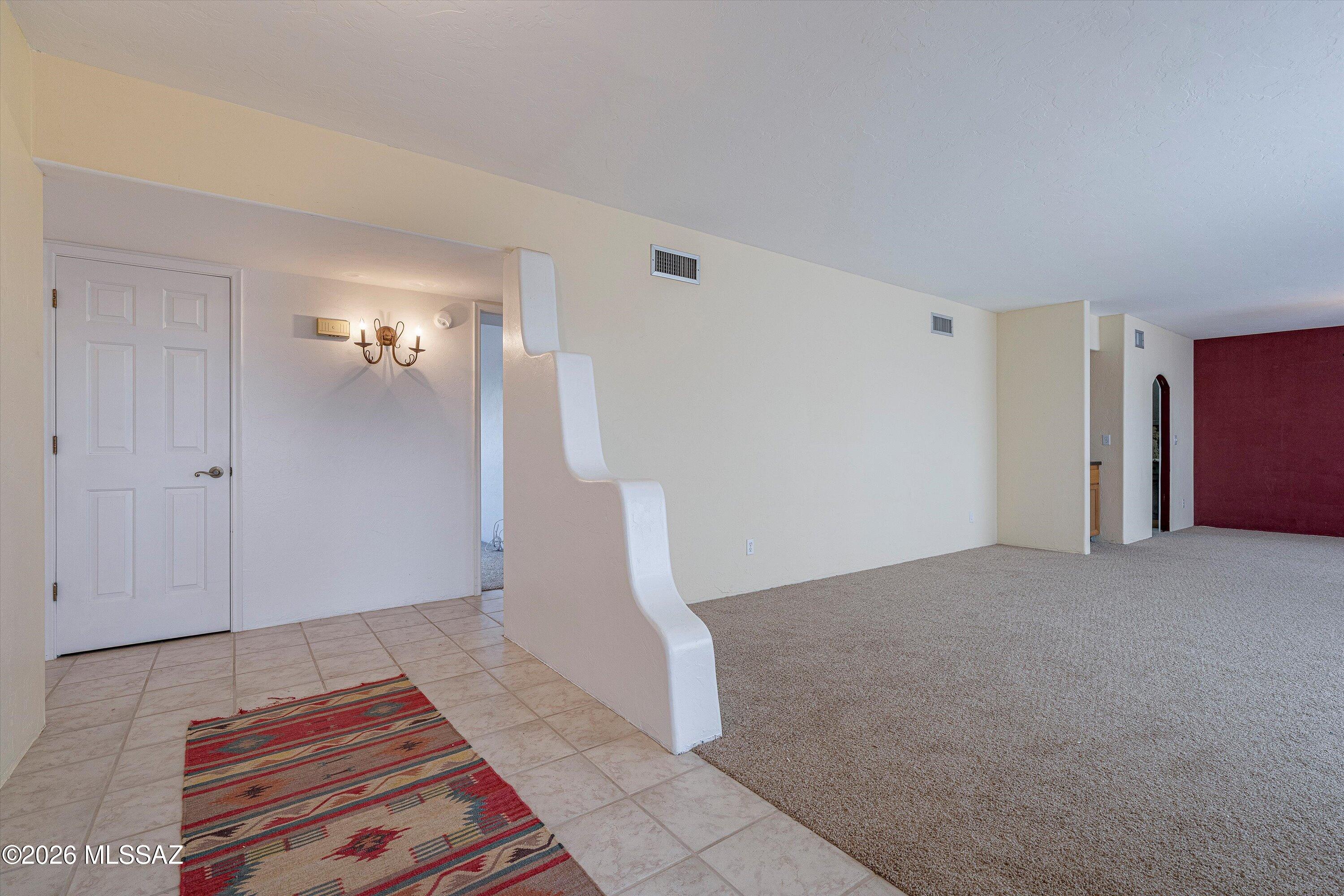 10961 East Roger Road Tucson, AZ 85749 - Photo 26 of 45 Front entry to Living Room