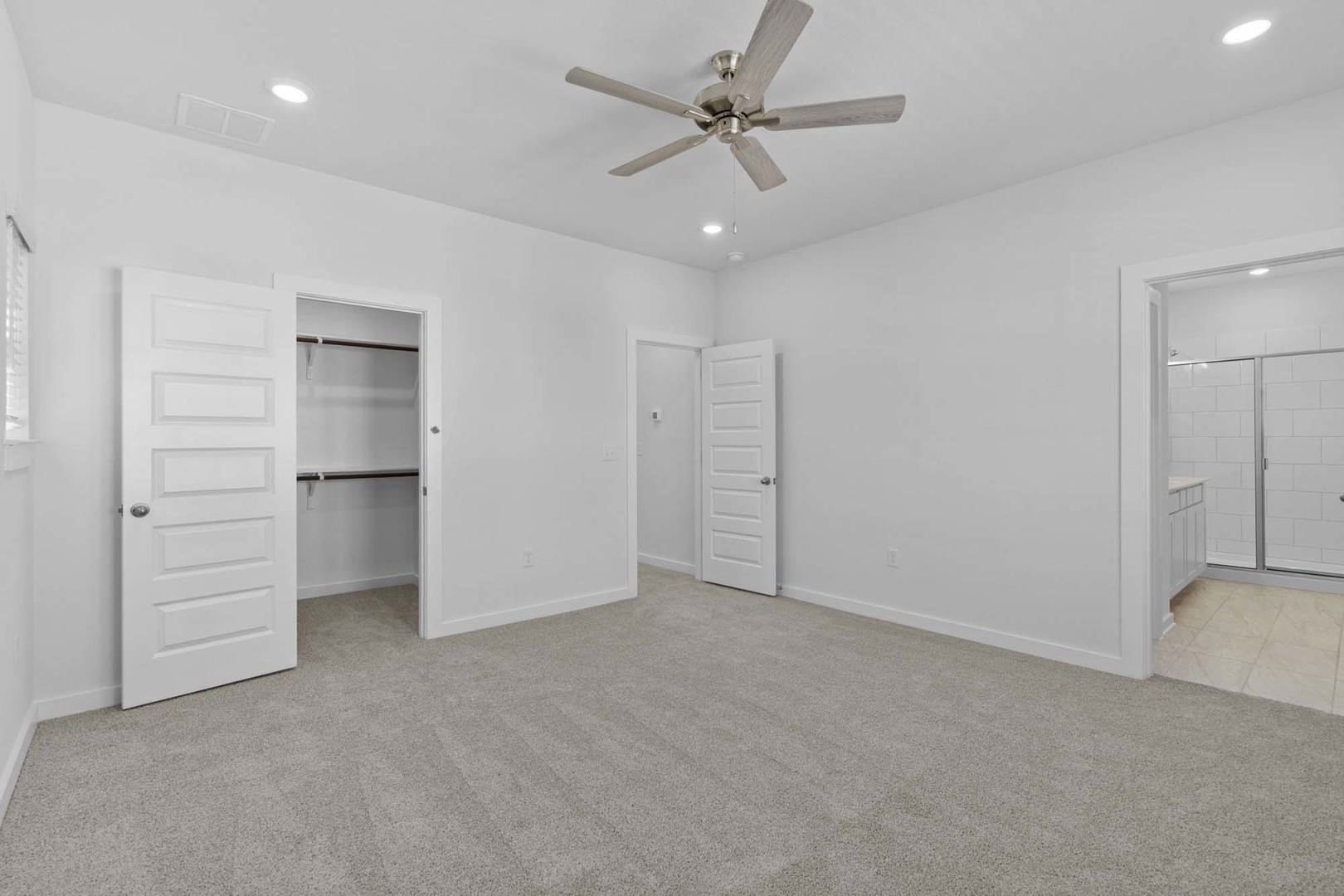 6400 Stockman Drive, Unit 6 Austin, TX 78747 - Photo 13 of 36 a view of an empty room with a ceiling fan