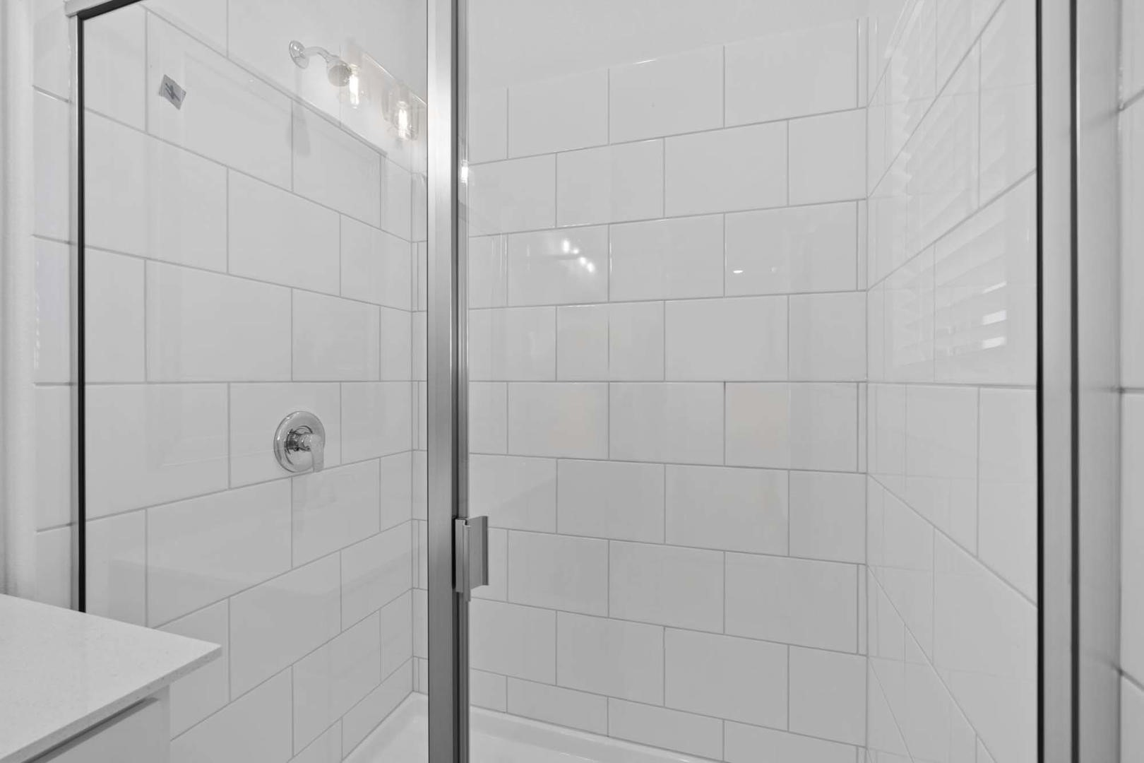 6400 Stockman Drive, Unit 6 Austin, TX 78747 - Photo 15 of 36 a bathroom with a shower