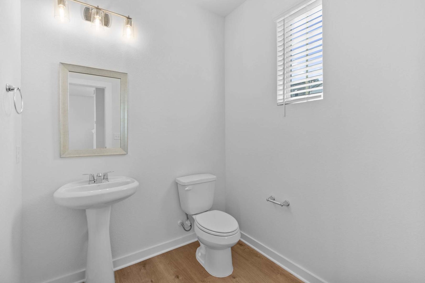 6400 Stockman Drive, Unit 6 Austin, TX 78747 - Photo 19 of 36 a bathroom with a toilet sink and mirror