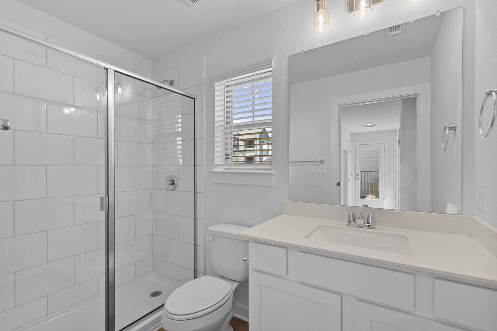 6400 Stockman Drive, Unit 6 Austin, TX 78747 - Photo 20 of 36 a bathroom with a sink toilet and shower