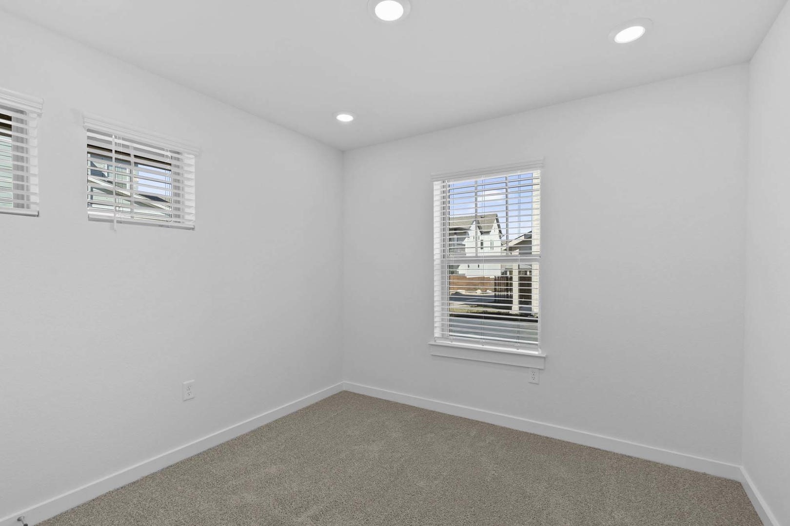 6400 Stockman Drive, Unit 6 Austin, TX 78747 - Photo 22 of 36 an empty room with windows