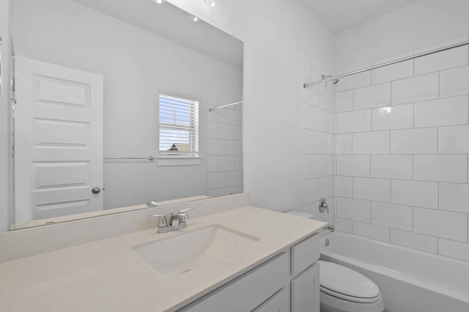 6400 Stockman Drive, Unit 6 Austin, TX 78747 - Photo 23 of 36 a bathroom with a sink a toilet and shower