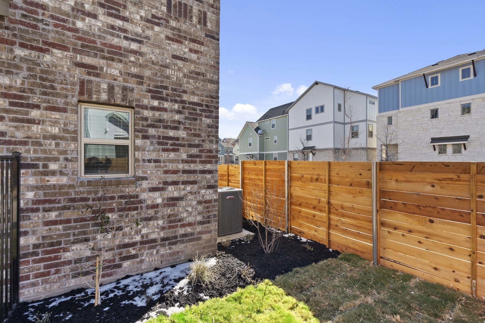 6400 Stockman Drive, Unit 6 Austin, TX 78747 - Photo 28 of 36 a view of a house with a backyard