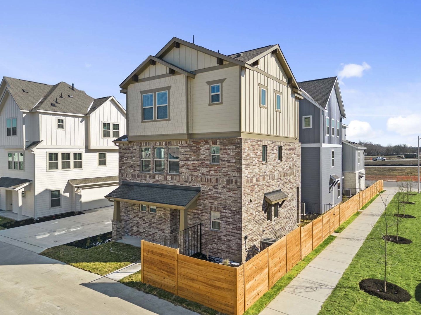 6400 Stockman Drive, Unit 6 Austin, TX 78747 - Photo 32 of 36 a front view of a house with a yard
