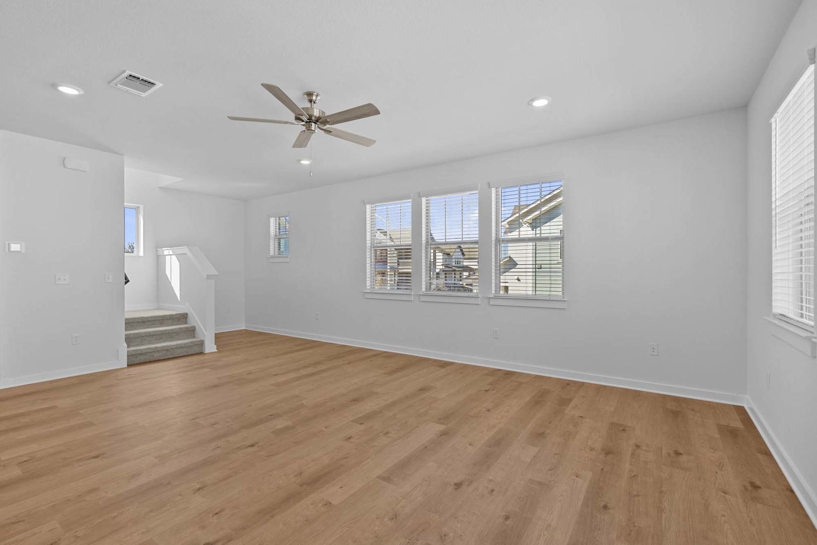 6400 Stockman Drive, Unit 6 Austin, TX 78747 - Photo 10 of 36 wooden floor in an empty room with a window
