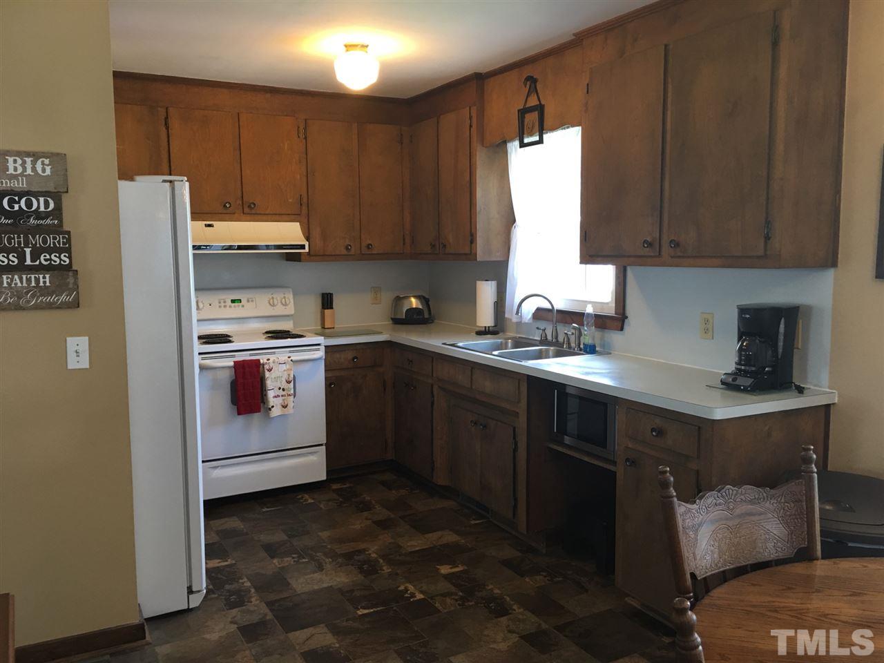 732 Clayhole Road Dunn, NC 28334 - Photo 8 of 18 Kitchen and dining room