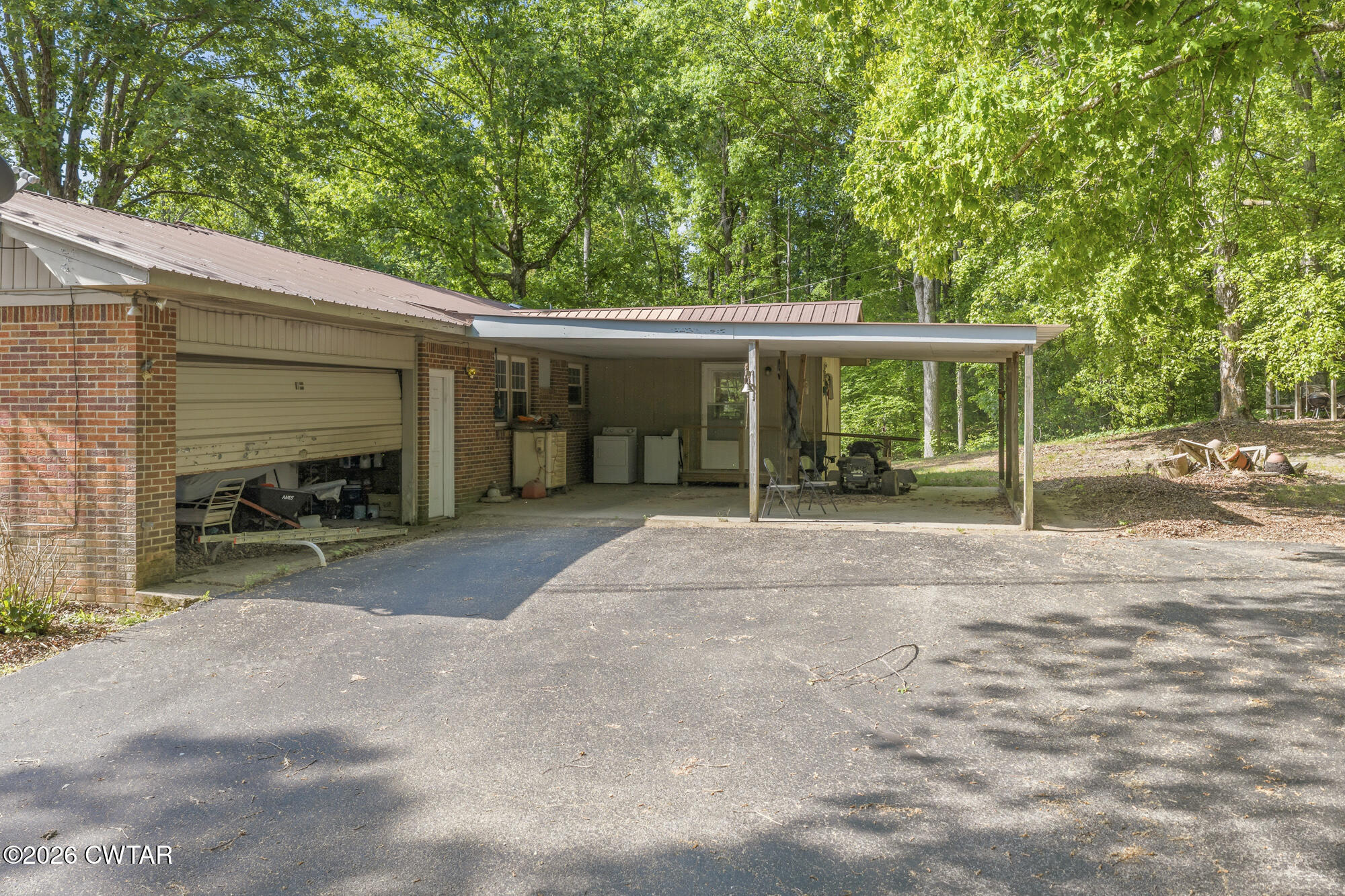 4536 Brooksie Thompson Road Decaturville, TN 38329 - Photo 3 of 39 DJI_20260427095454_0100_D