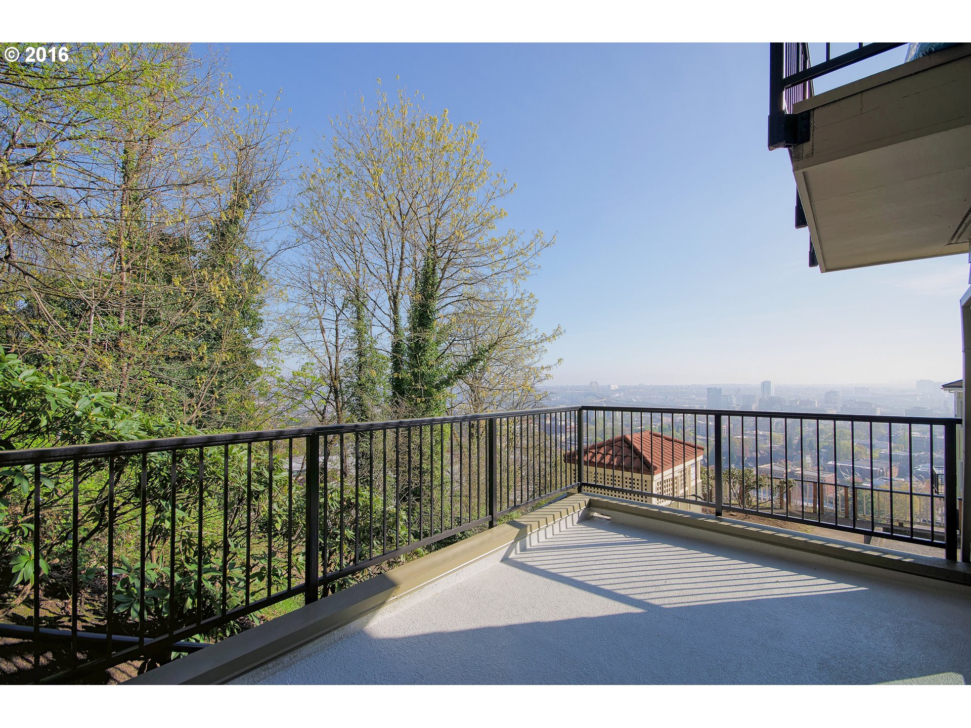 423 Northwest Uptown Terrace, Unit 1B Portland, OR 97210 - Photo 22 of 23 a view of balcony with furniture