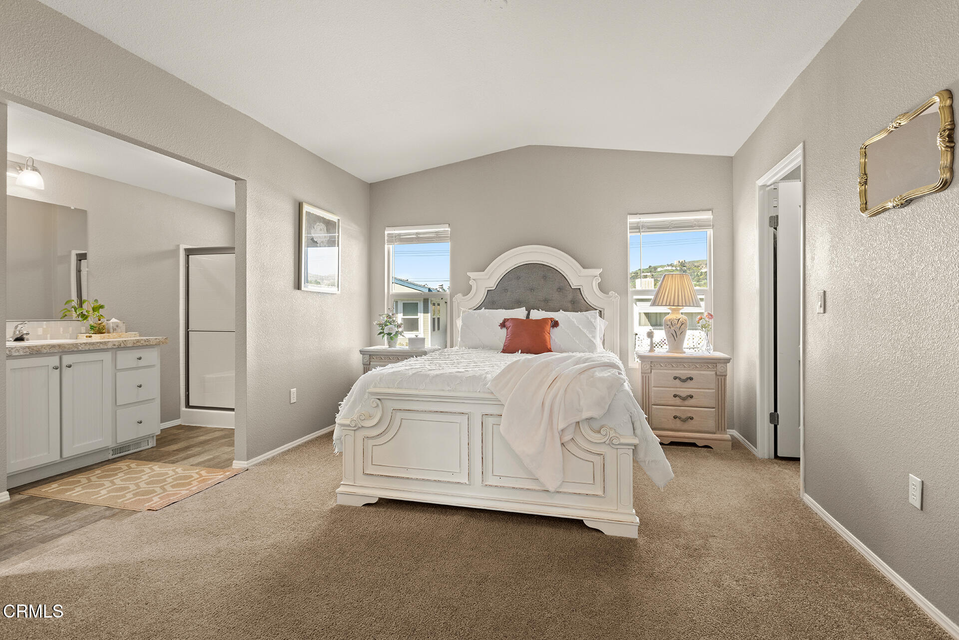 1500 Richmond Road, Unit 64 Santa Paula, CA 93060 - Photo 6 of 11 a spacious bedroom with a bed and a cabinets