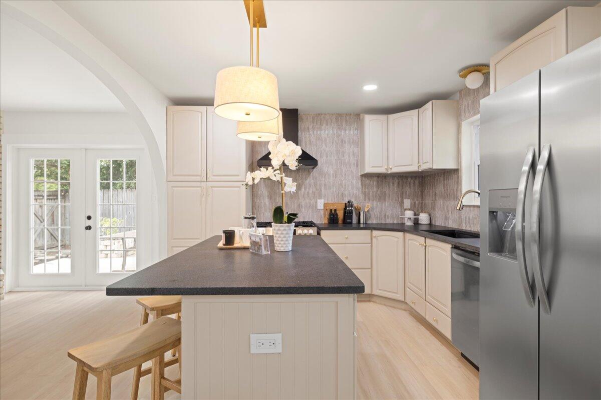 403 Cheyenne Circle Fort Walton Beach, FL 32547 - Photo 17 of 39 a kitchen with kitchen island a counter top space appliances and cabinets