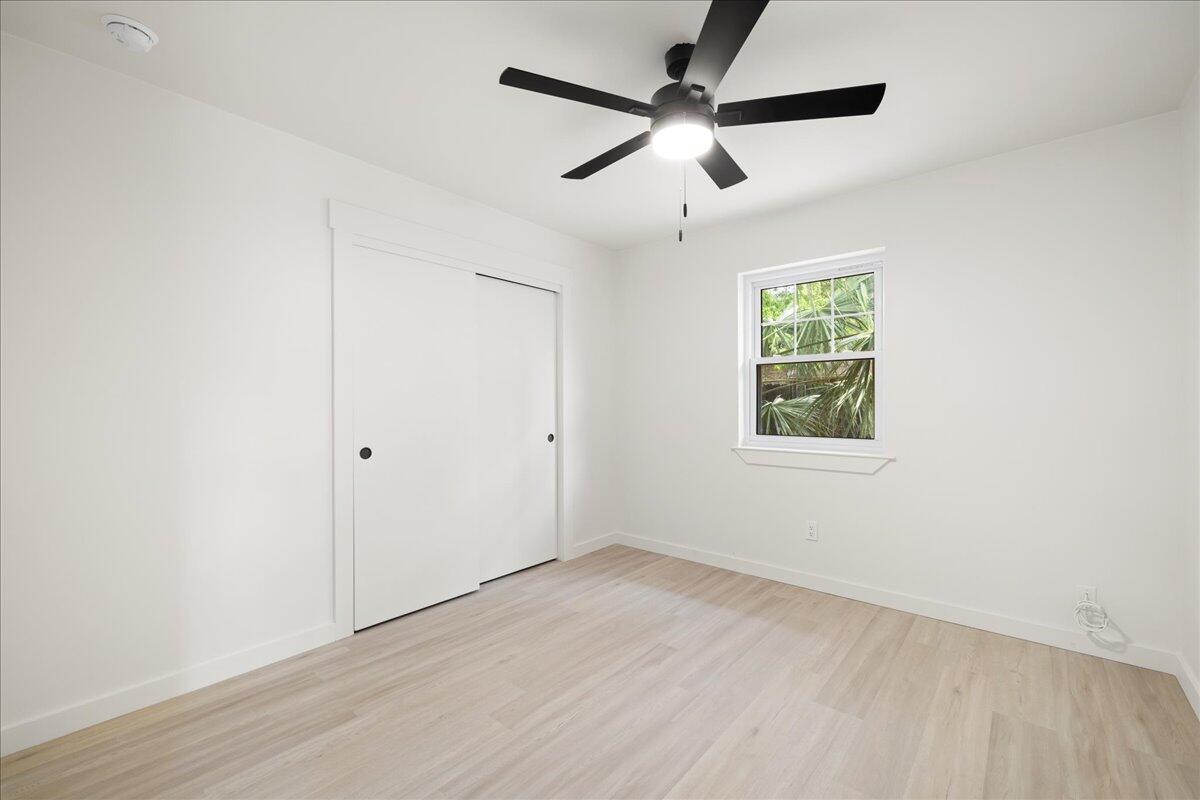 403 Cheyenne Circle Fort Walton Beach, FL 32547 - Photo 24 of 39 an empty room with ceiling fan and windows