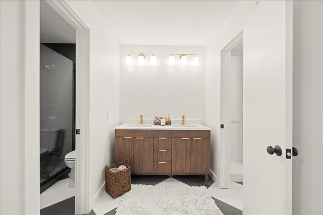 a view of a bathroom with a tub and shower