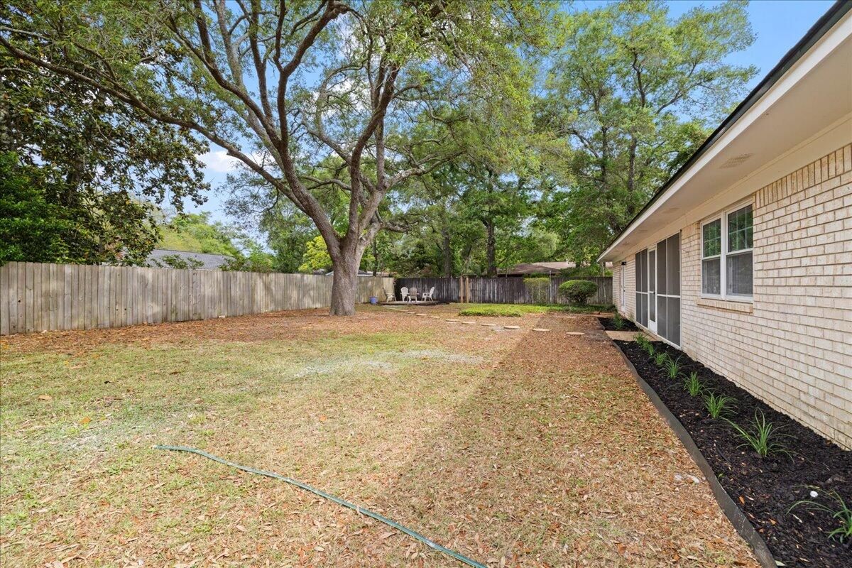 403 Cheyenne Circle Fort Walton Beach, FL 32547 - Photo 36 of 39 a house with trees in front of it