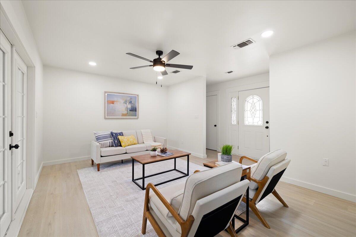 403 Cheyenne Circle Fort Walton Beach, FL 32547 - Photo 6 of 39 a view of a livingroom with furniture and wooden floor