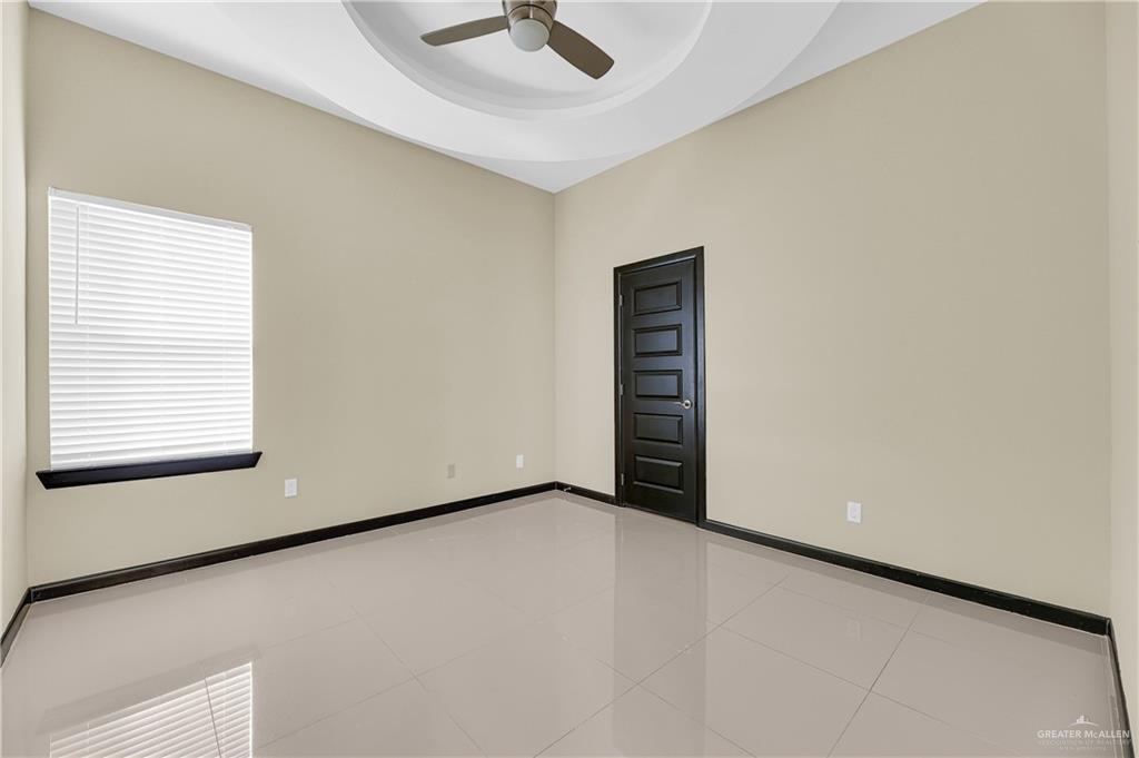 1720 Rice Avenue McAllen, TX 78504 - Photo 13 of 19 a view of an empty room with a window
