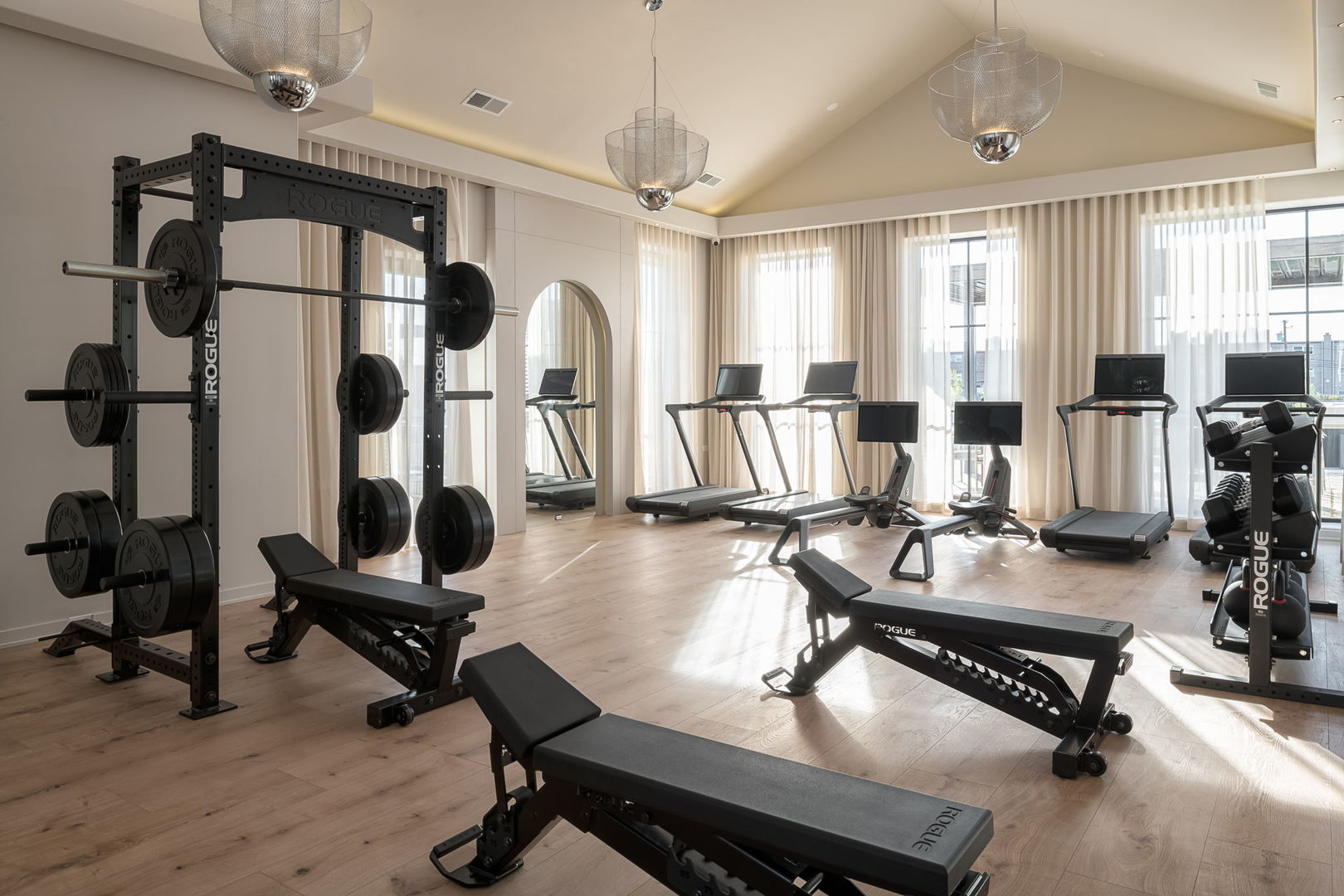 8003 West Belmont Avenue, Unit 203 River Grove, IL 60171 - Photo 18 of 35 a living room with furniture gym equipment and a large window
