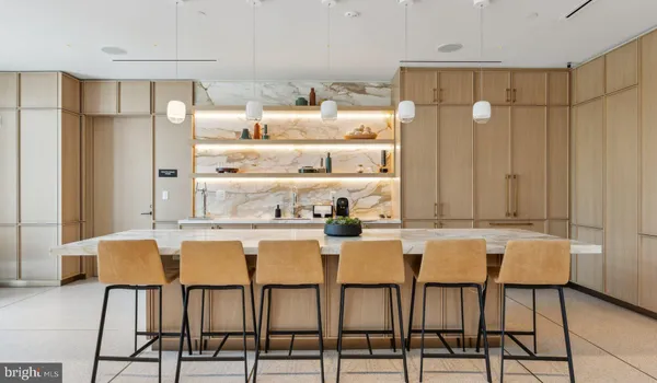 a dining area with furniture and window