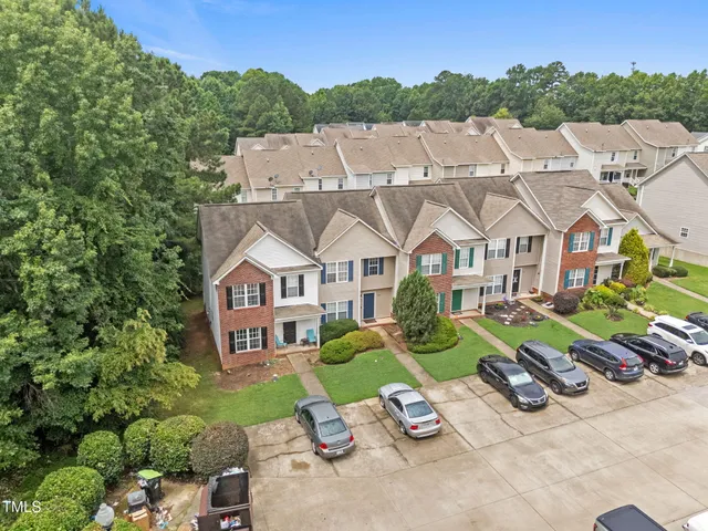 an aerial view of a house with a garden