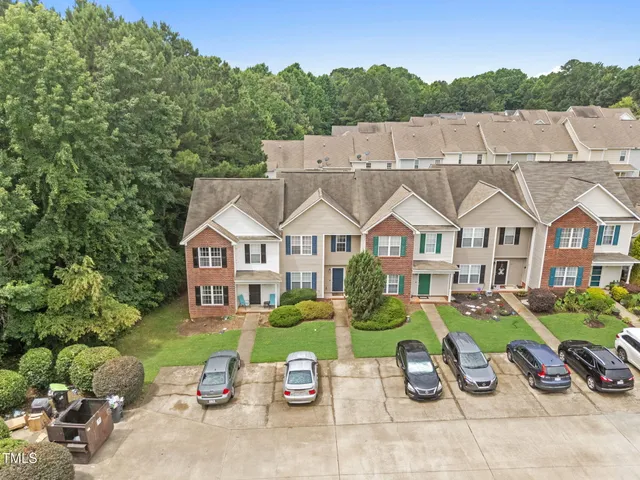an aerial view of a house with garden