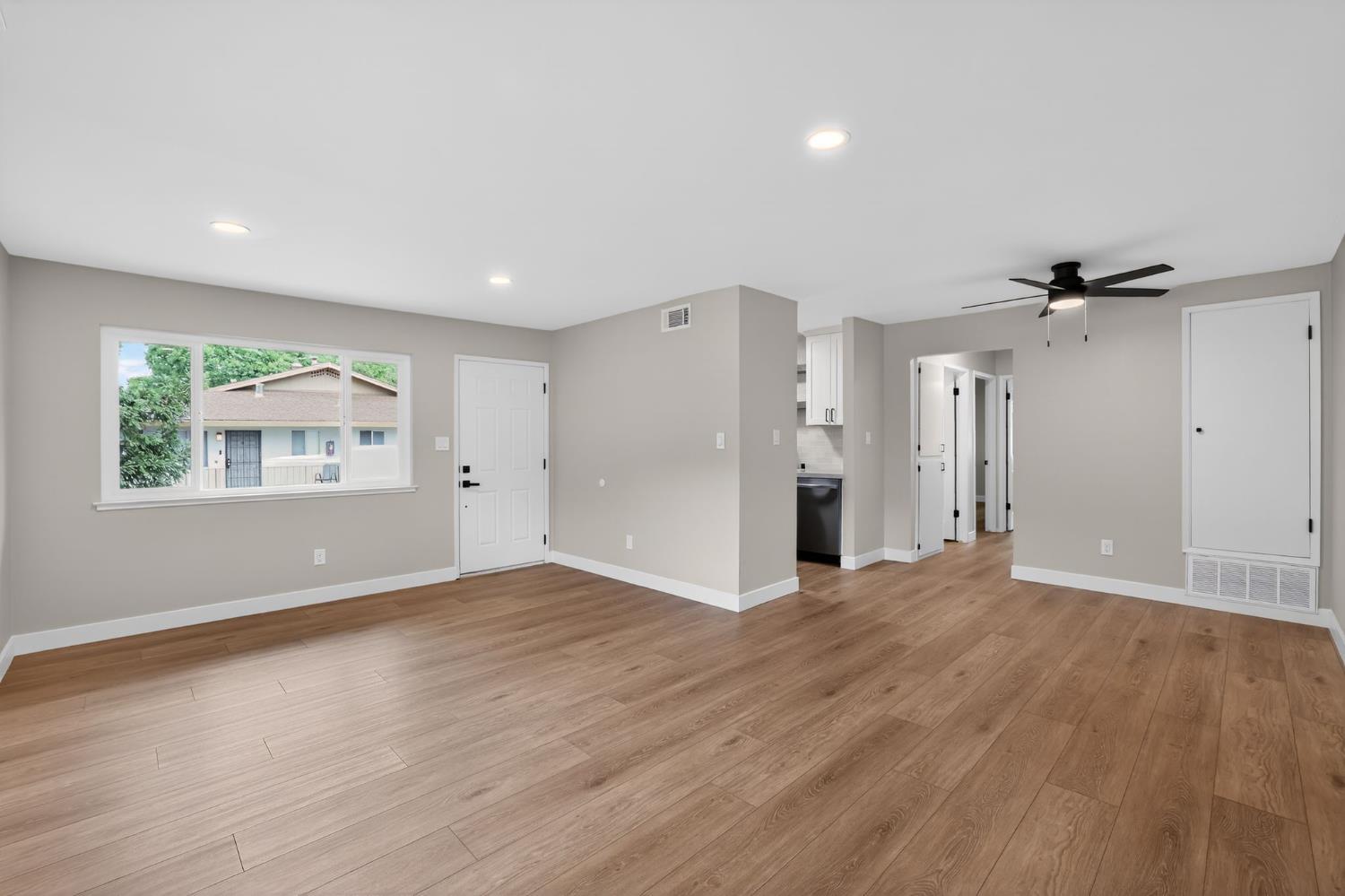 6281 Cavan Drive, Unit 4 Citrus Heights, CA 95621 - Photo 2 of 12 wooden floor in an empty room with a window