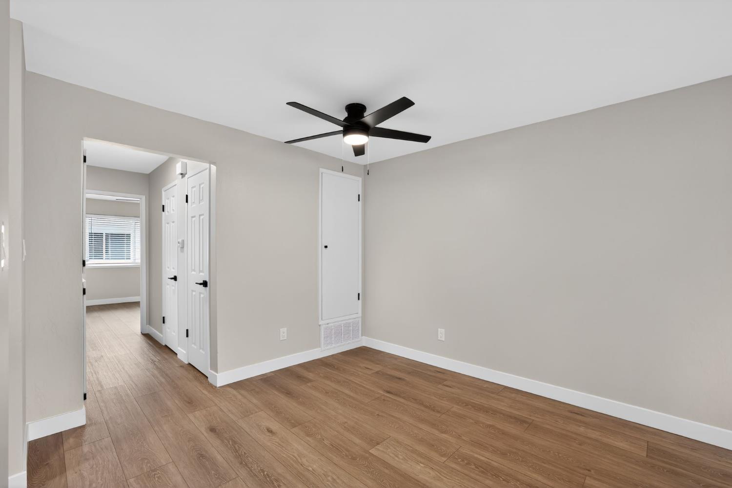 6281 Cavan Drive, Unit 4 Citrus Heights, CA 95621 - Photo 6 of 12 wooden floor in an empty room with a window
