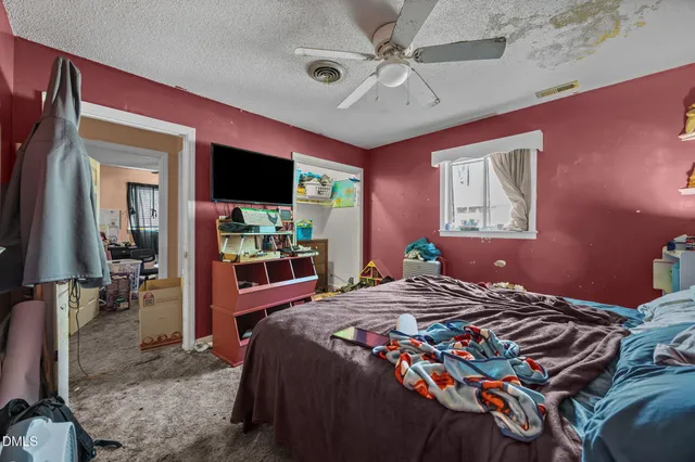 a bathroom with a sink mirror and vanity