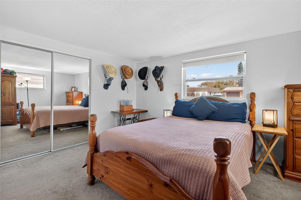 5134 Reseda Drive New Port Richey, FL 34652 - Photo 16 of 37 a bedroom with bed and window