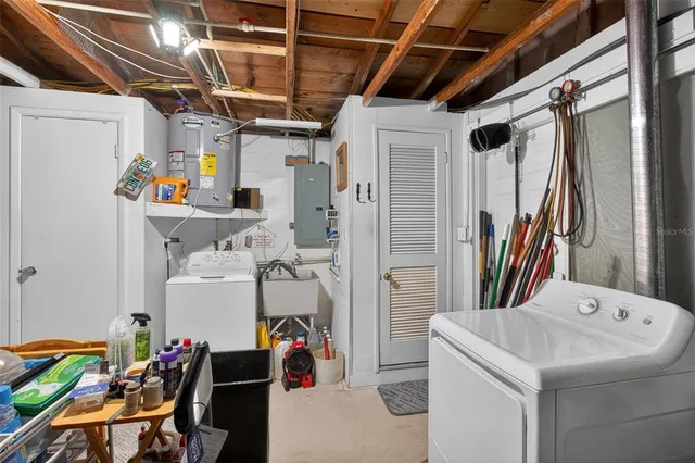a utility room with dryer and washer