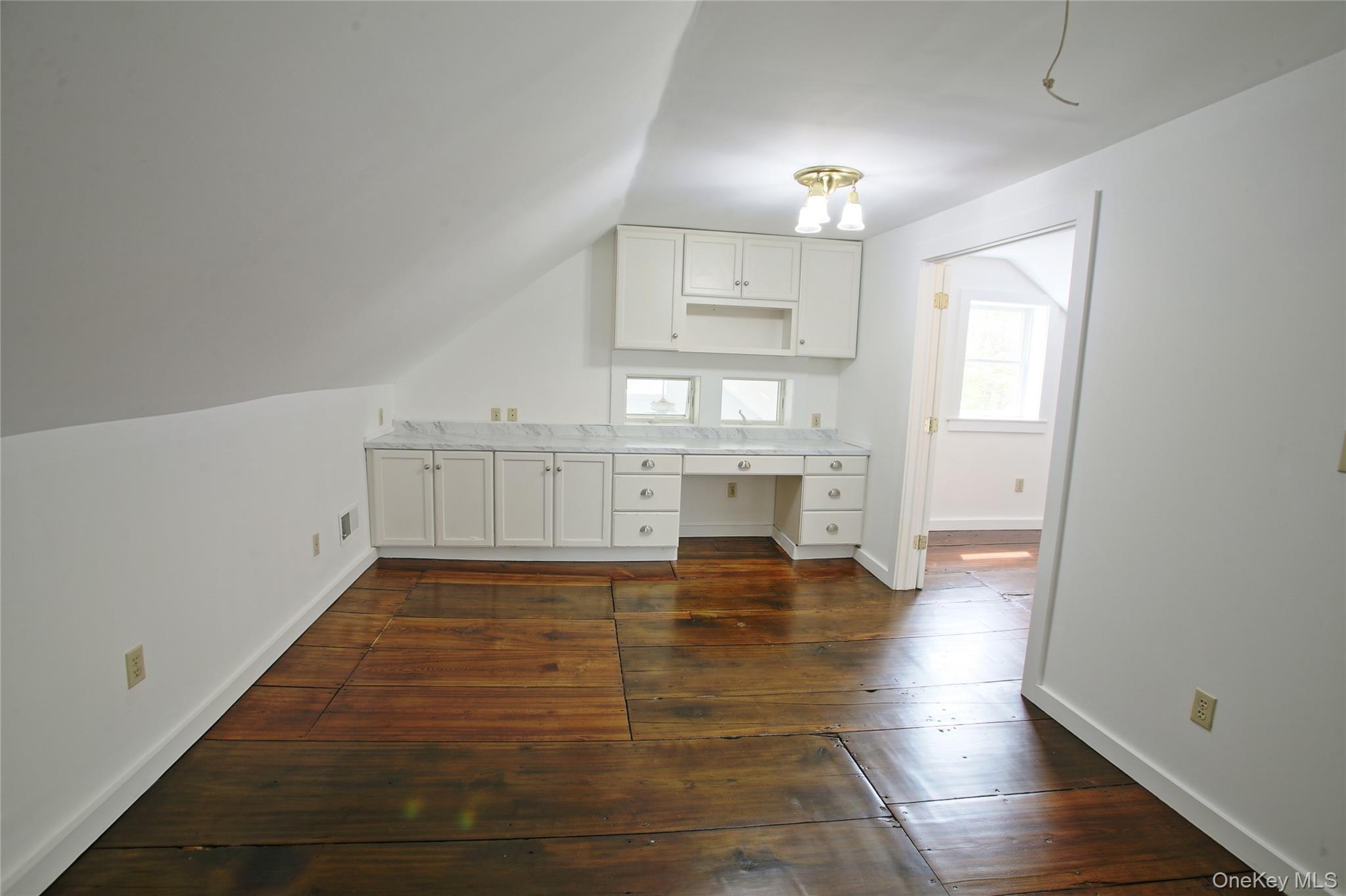 292 Mountain View Road Rhinebeck, NY 12572 - Photo 28 of 30 a view of empty room with wooden floor and fireplace