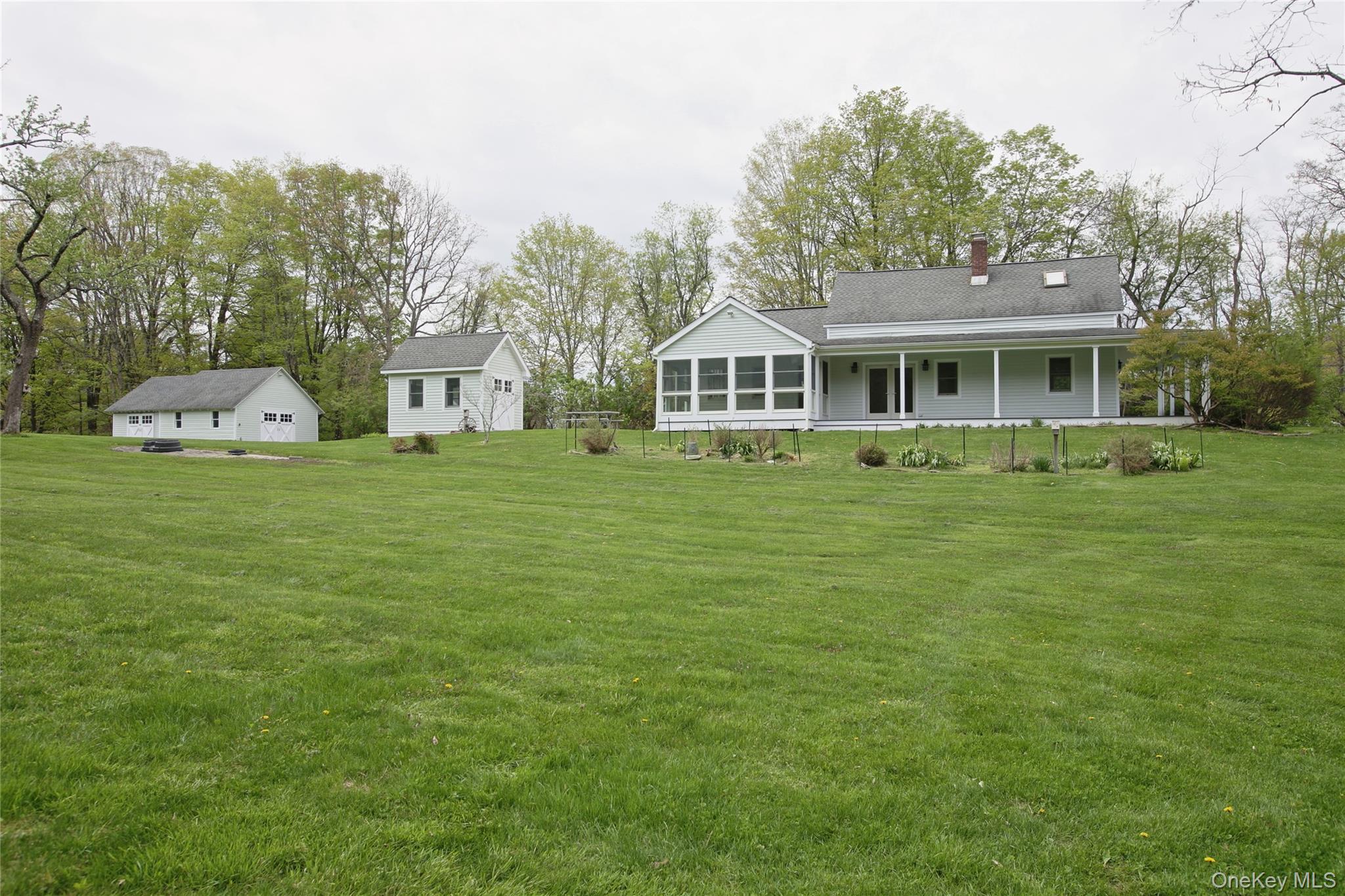 292 Mountain View Road Rhinebeck, NY 12572 - Photo 4 of 30 a front view of a house with a garden