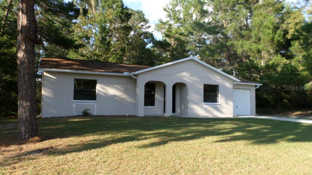 2355 Ring Road Spring Hill, FL 34609 - Photo 1 of 1 Front